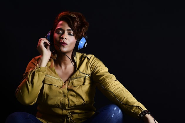 Woman listening to headphones