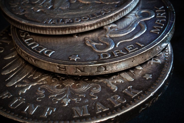 Closeup of three vintage coins
