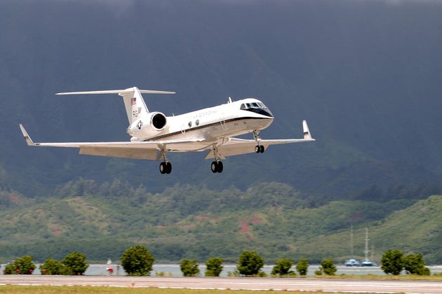 A private jet lands at an airport